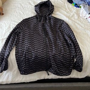 This is a great Burberry Windbreaker size L.